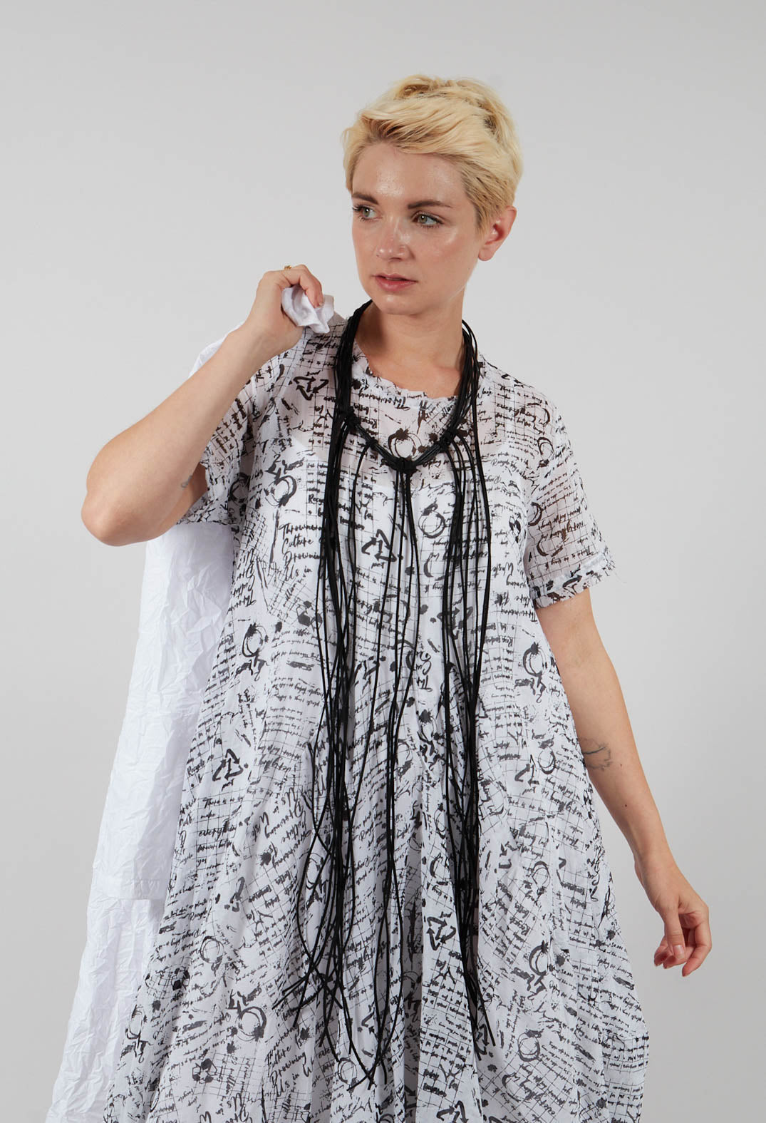 Handkerchief Hem Dress in White with Black Seregraphy