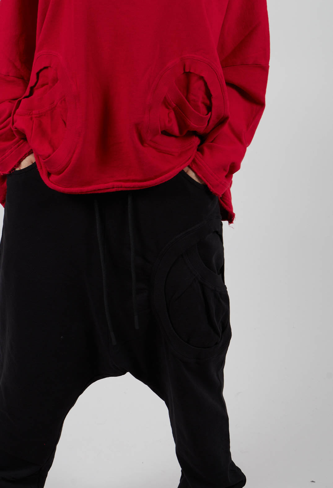 Drop Crotch Trousers with Circular Pocket in Black - 3250102