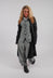 Tulip Hem Coat with Circular Pockets in Black - 3631213