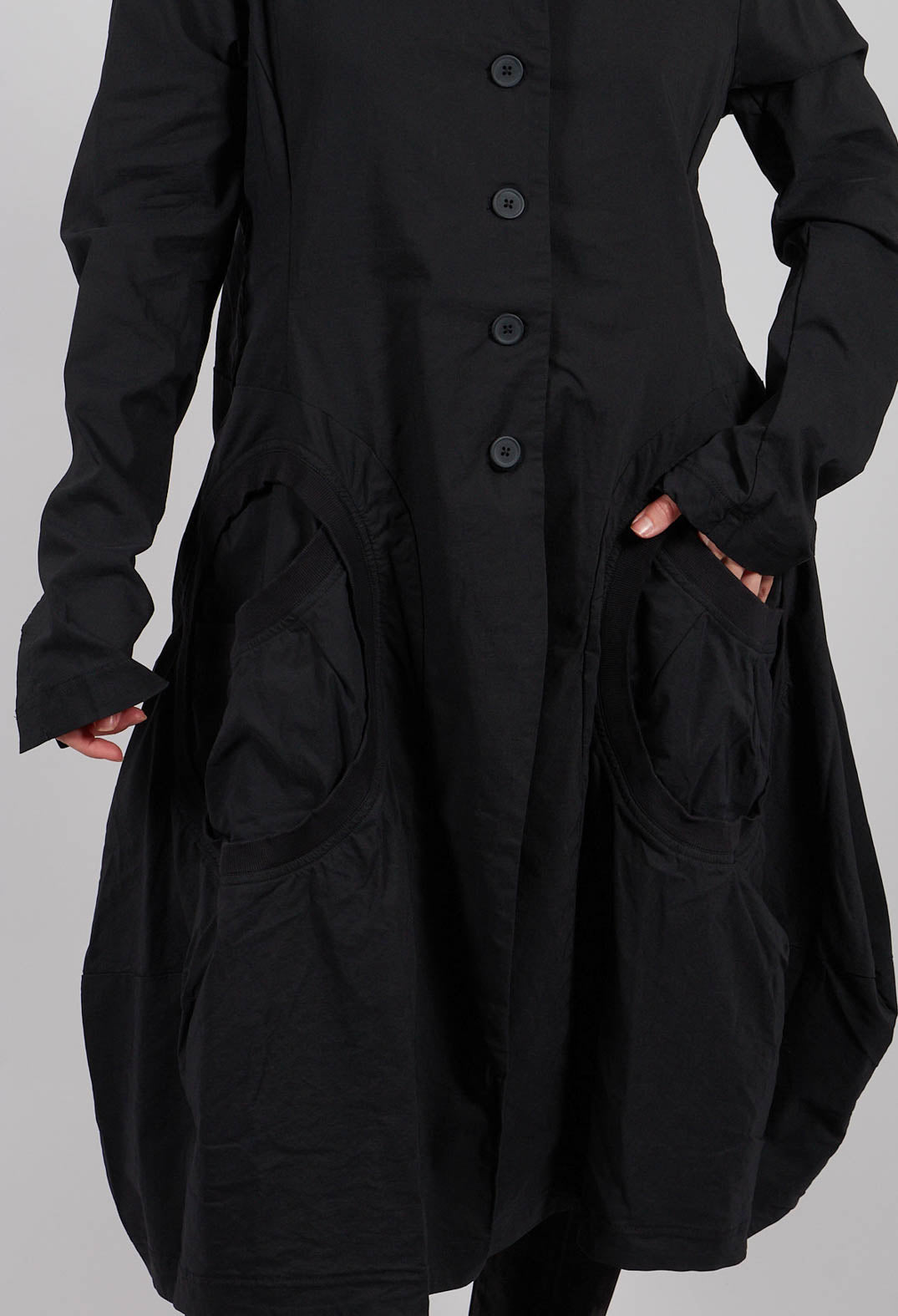Tulip Hem Coat with Circular Pockets in Black - 3631213