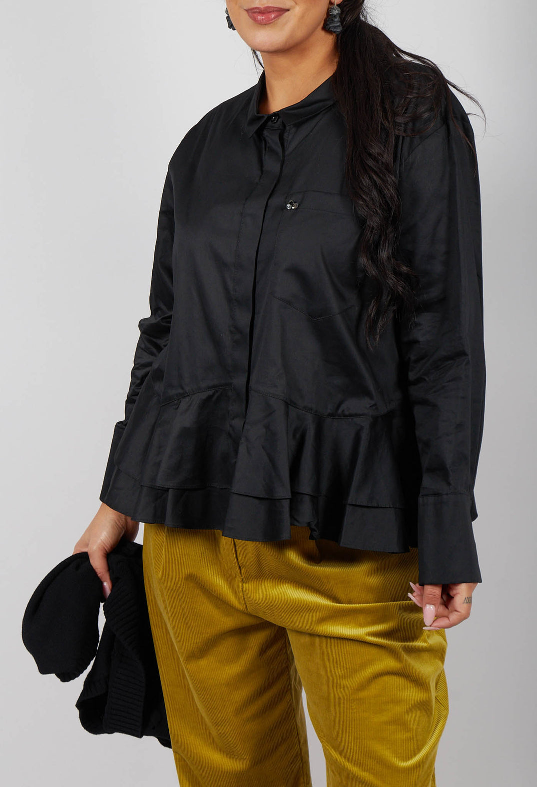 Shirt with Ruffle Peplum Hem in Black