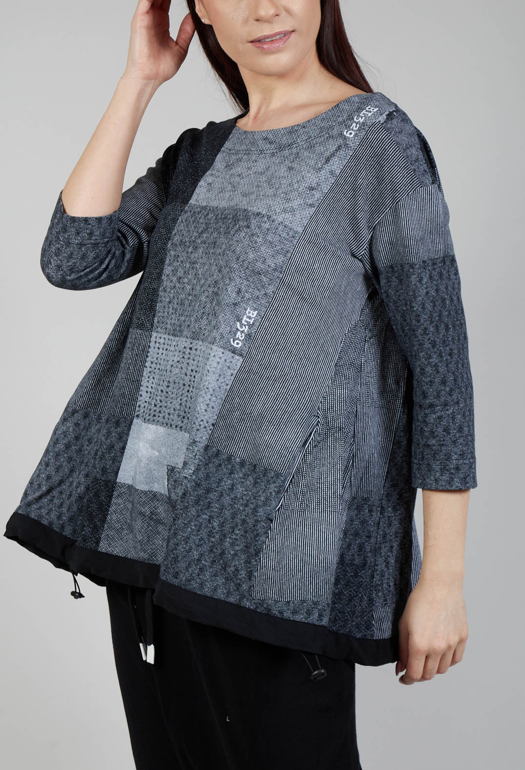 Cropped Sleeve Top with Drawstring Hem in Black Print