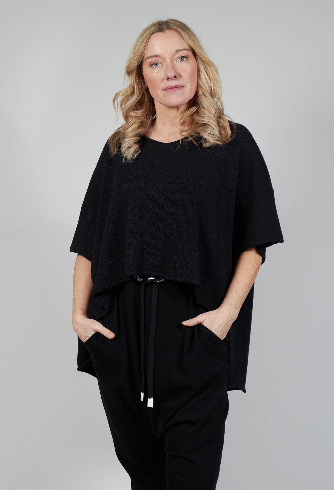 Curved Hem Jumper with Raw Edges in Black
