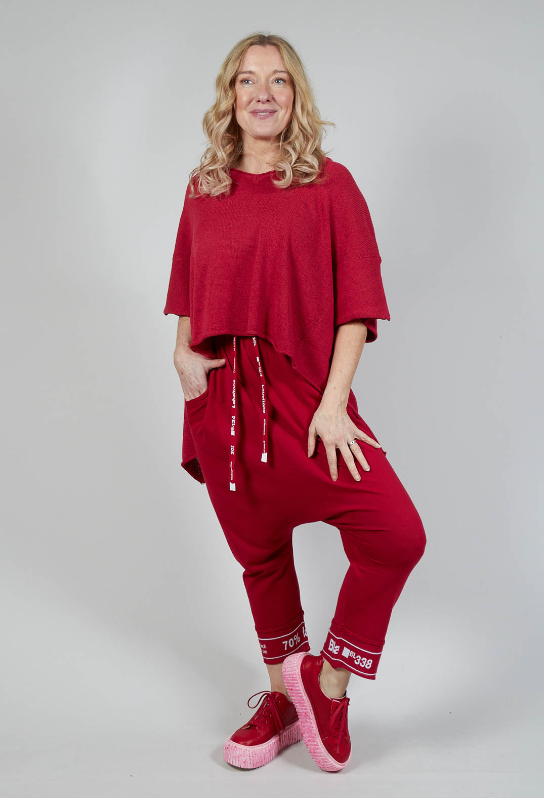 Curved Hem Jumper with Raw Edges in Chili