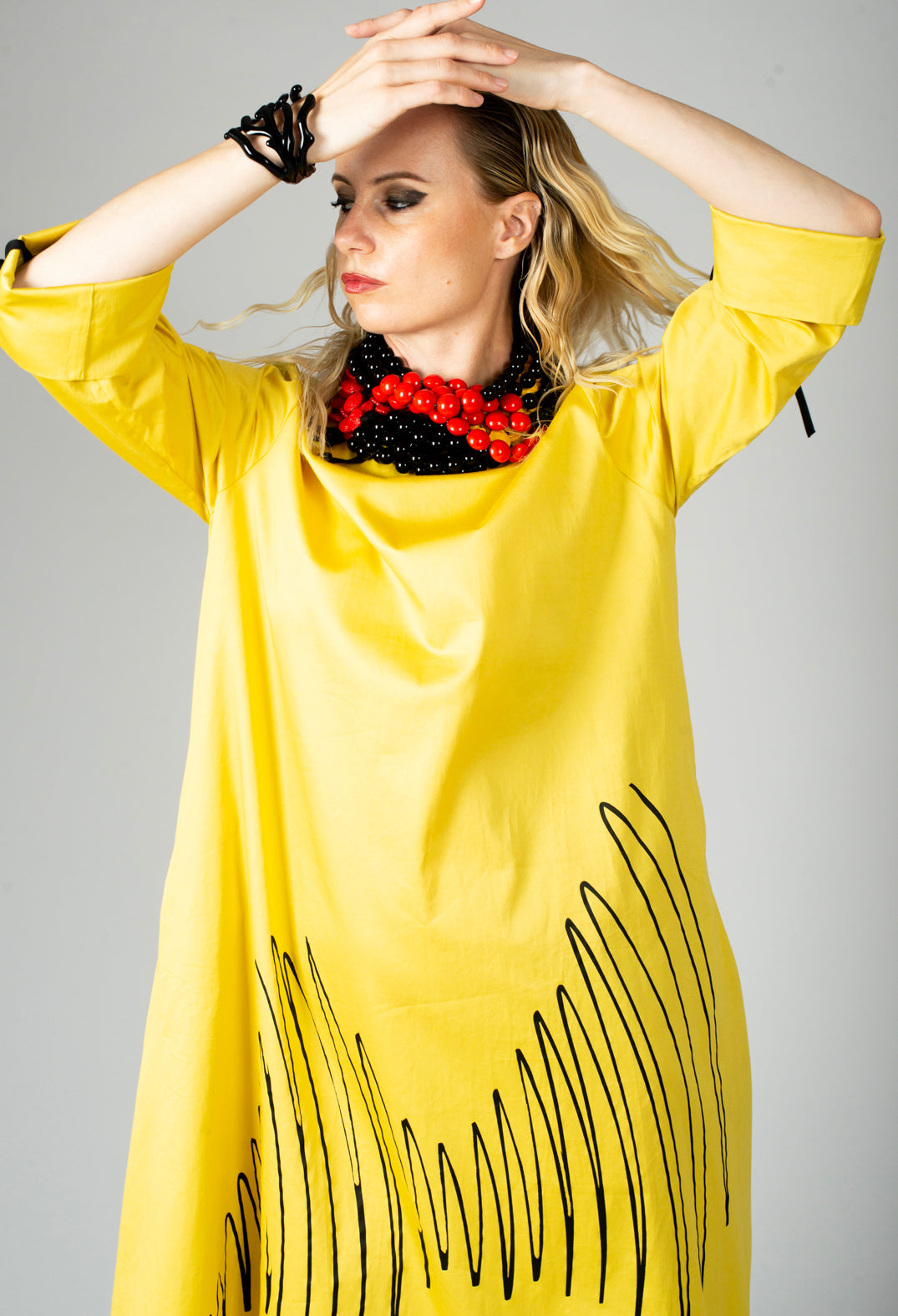 Stich Dress in Black and Gold