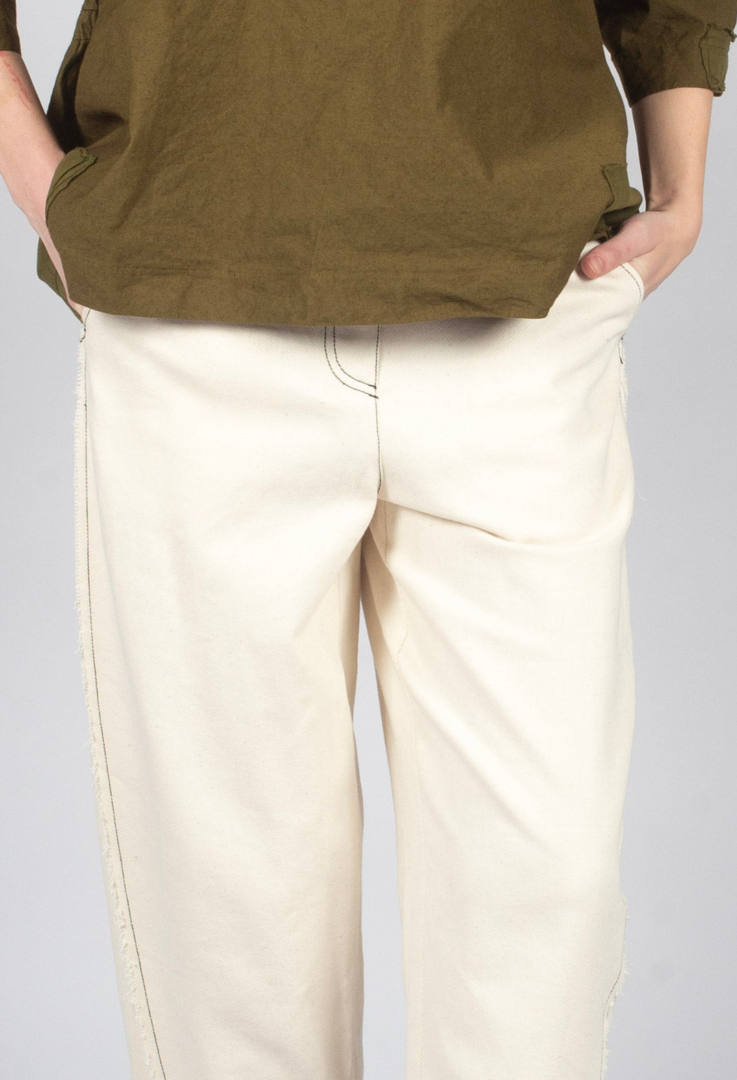 Raw Hemmed Jean Trousers in Off White