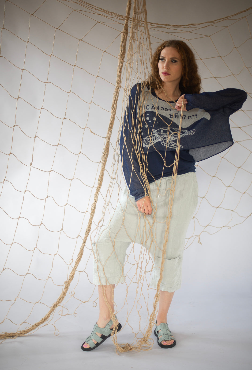 Cropped Pullover with High Low Hem in Navy Jacquard
