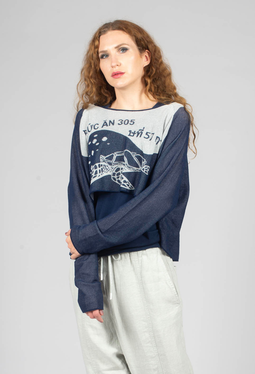 Cropped Pullover with High Low Hem in Navy Jacquard