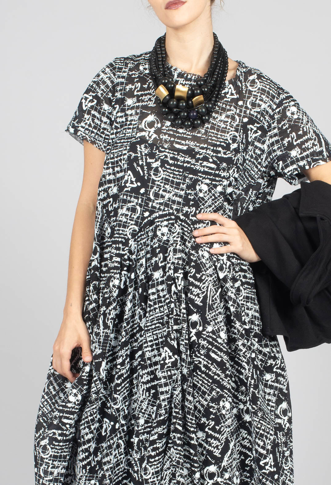 Handkerchief Hem Dress in Black with White Seregraphy