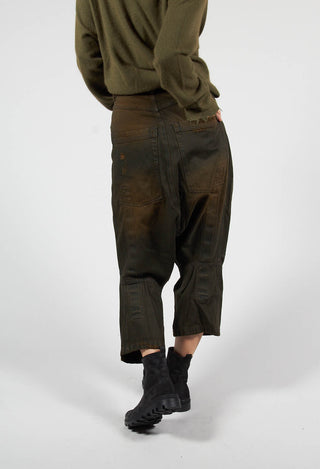 khaki drop crotch cropped leg trousers behind shot