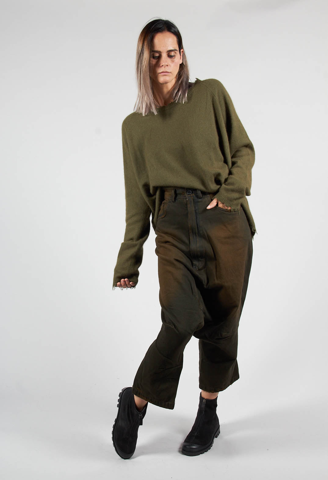 lady wearing drop crotch trousers in khaki with cropped leg detail