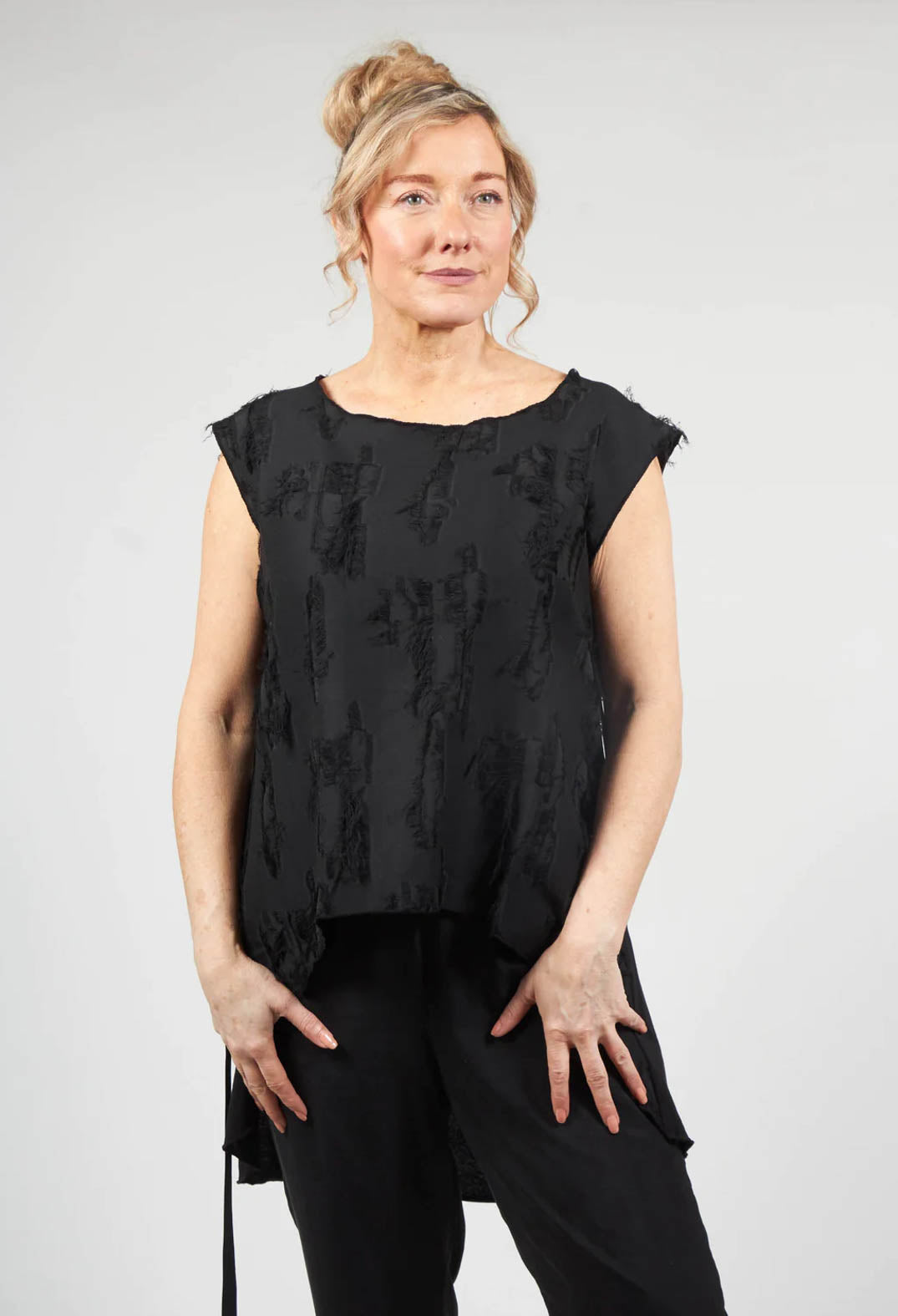 Sleeveless Top with Fringe Detail in Nero