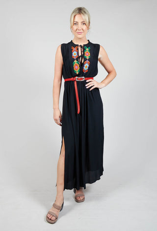 lady wearing a maxi dress with embellished detail in black