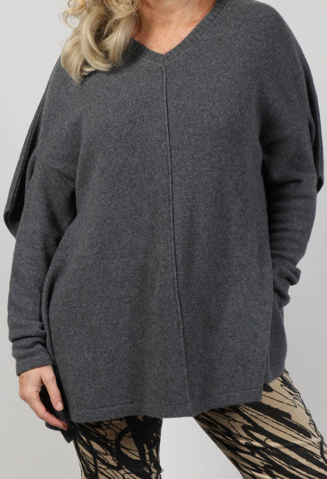 close up of a jumper in anthra grey with a v-neckline
