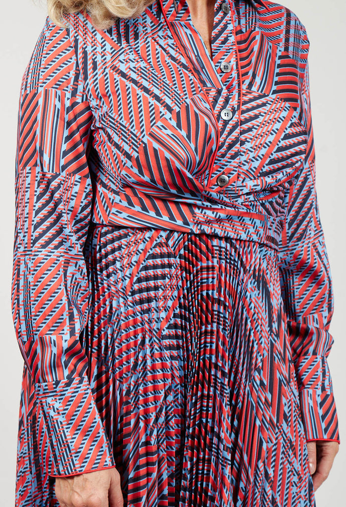 close up of red and blue printed maxi dress