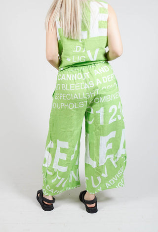 Linen Trousers with Large Lettering in Lime Print