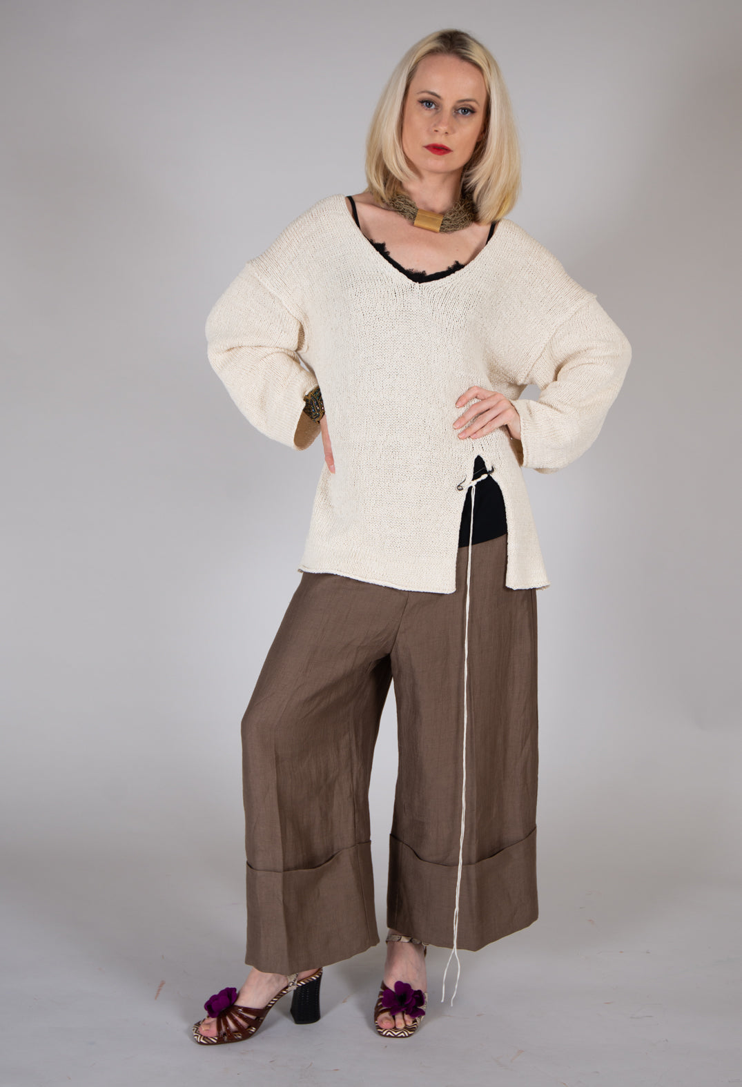 cami top in black with a cream jumper over the top