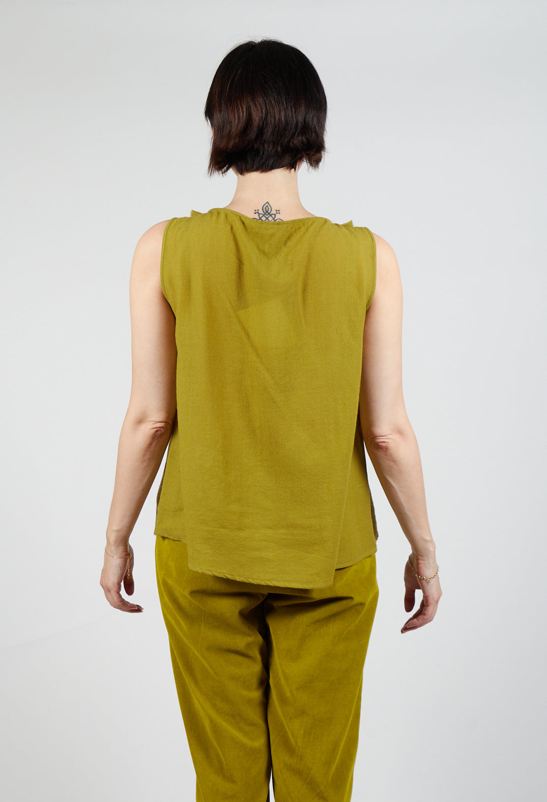 Peplum Vest in Grass Green