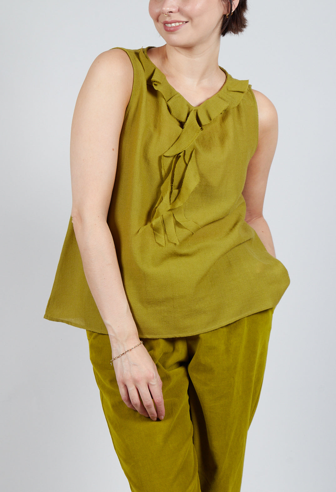 Peplum vest top deals