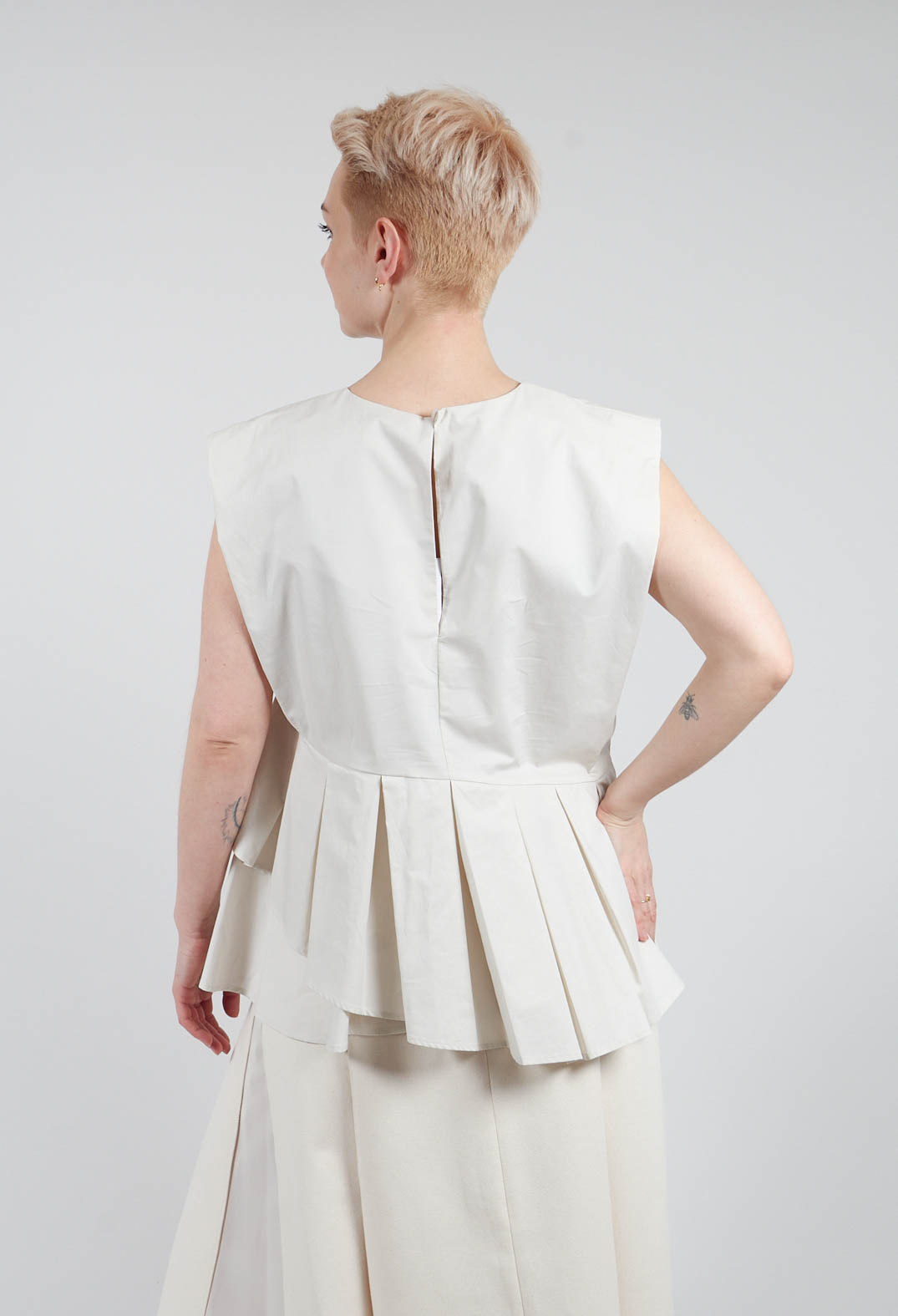 Round Neck Peplum Top in Oyster