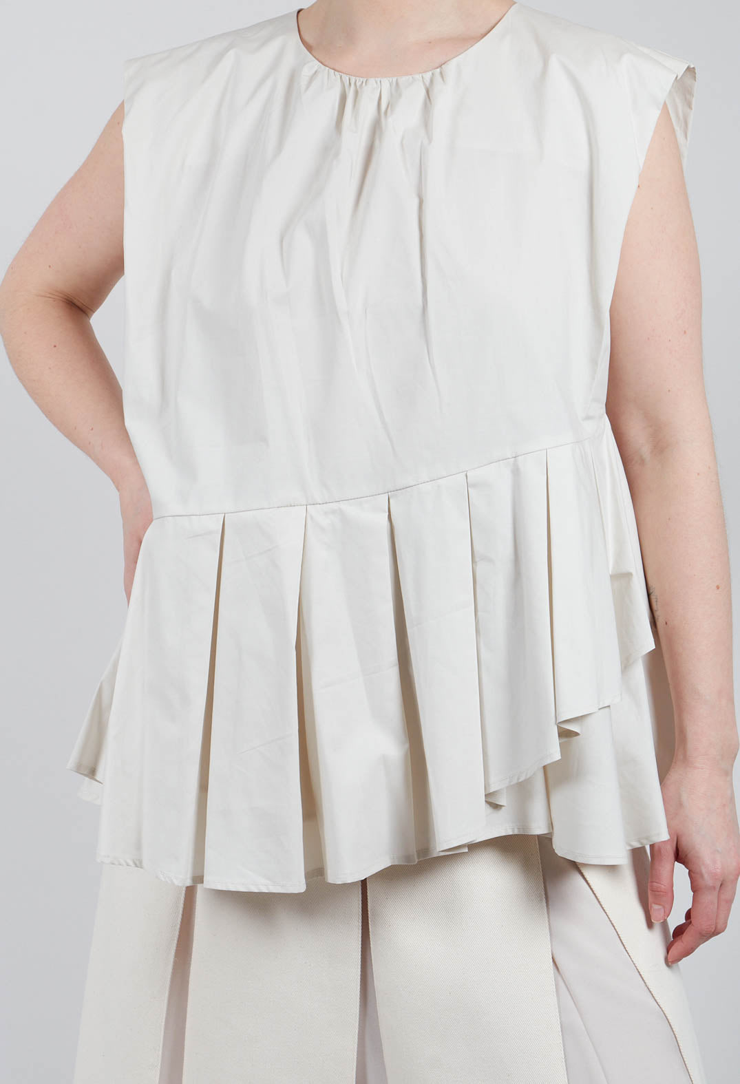 Round Neck Peplum Top in Oyster