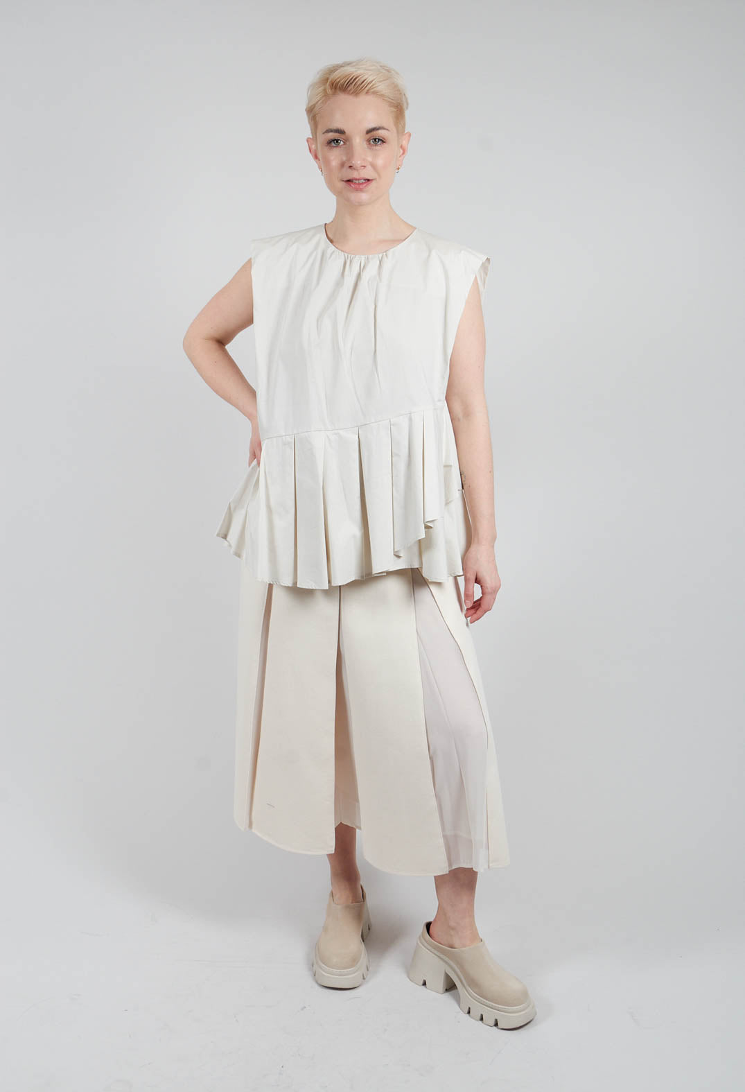 Round Neck Peplum Top in Oyster