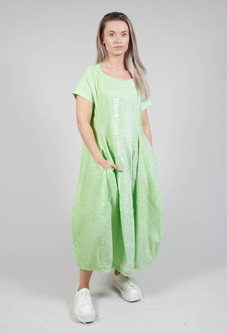 Short Sleeve Dress with Tulip Hem in Placed Lime Print