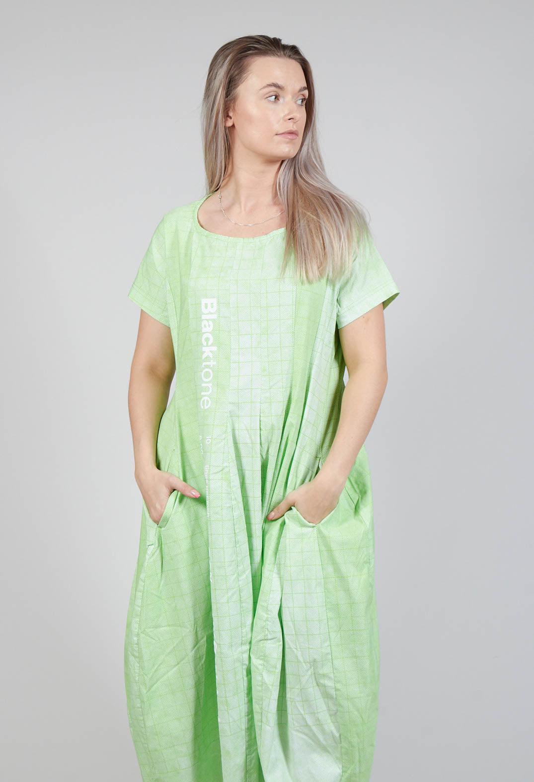 Short Sleeve Dress with Tulip Hem in Placed Lime Print