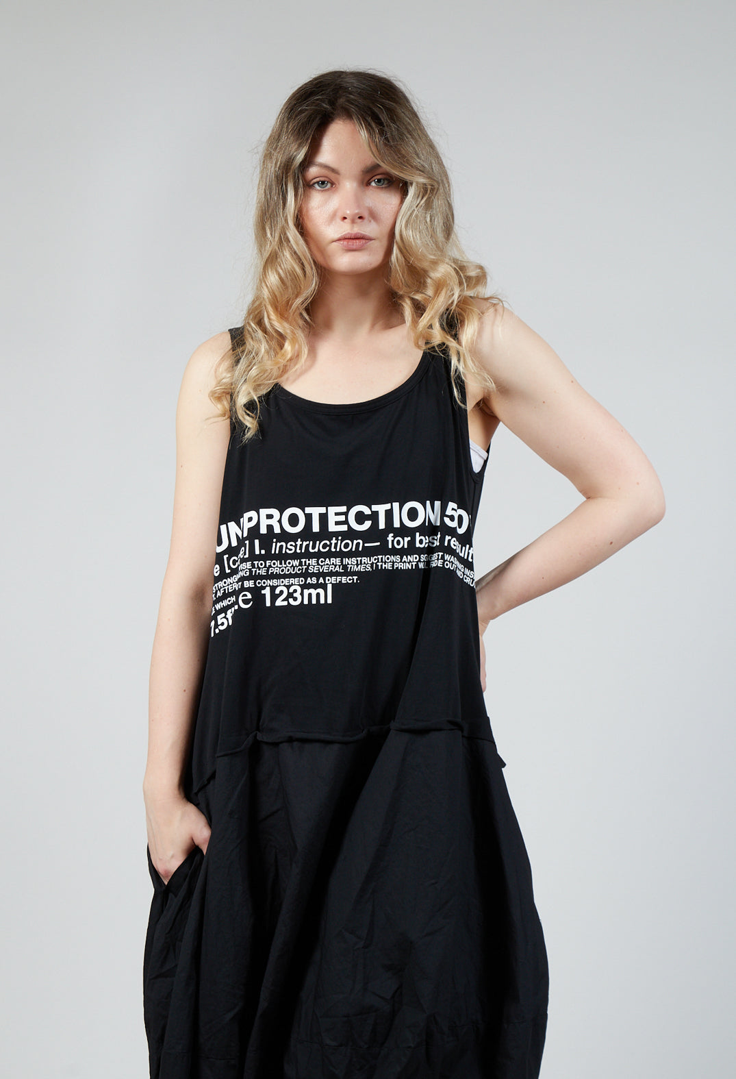 Sleeveless Dress with Lettering Motif in Black Print