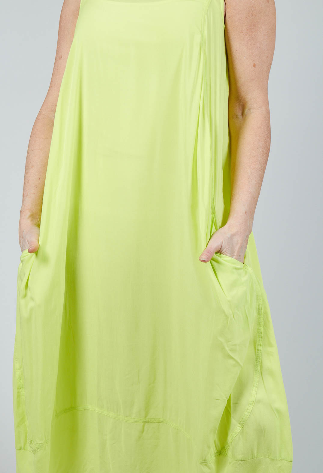 Sleeveless Jersey Dress with Tulip Hem in Sun