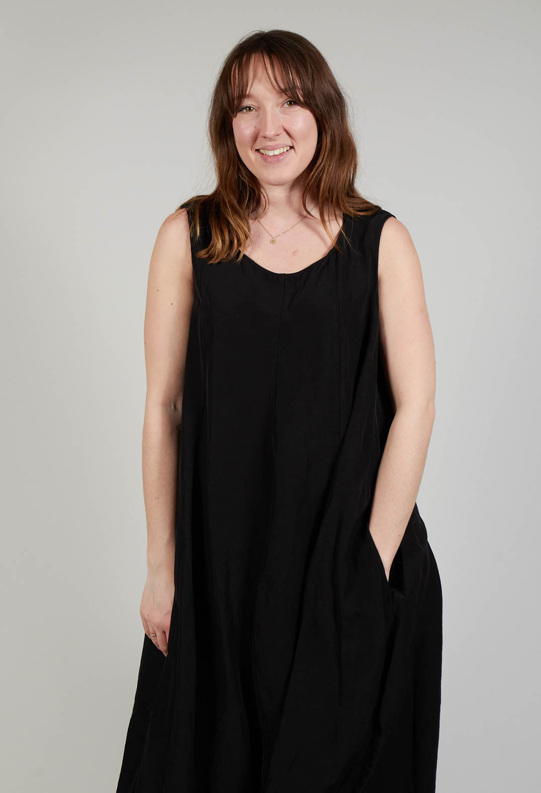 Sleeveless Tulip Hem Dress in Black