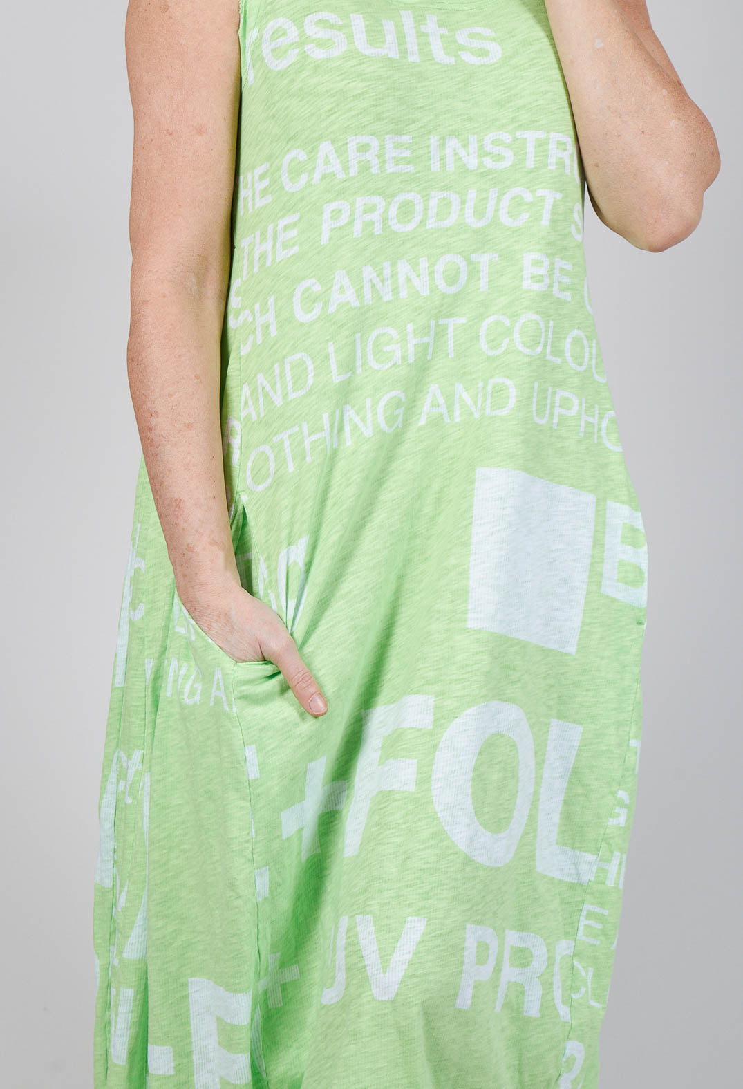 Tulip Hem Sleeveless Dress in Lime Print