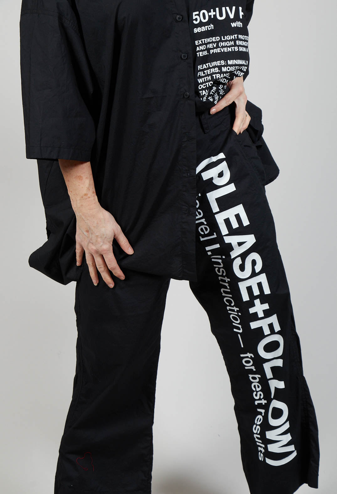 Wide Leg Trousers with Lettering Motif in Black Print