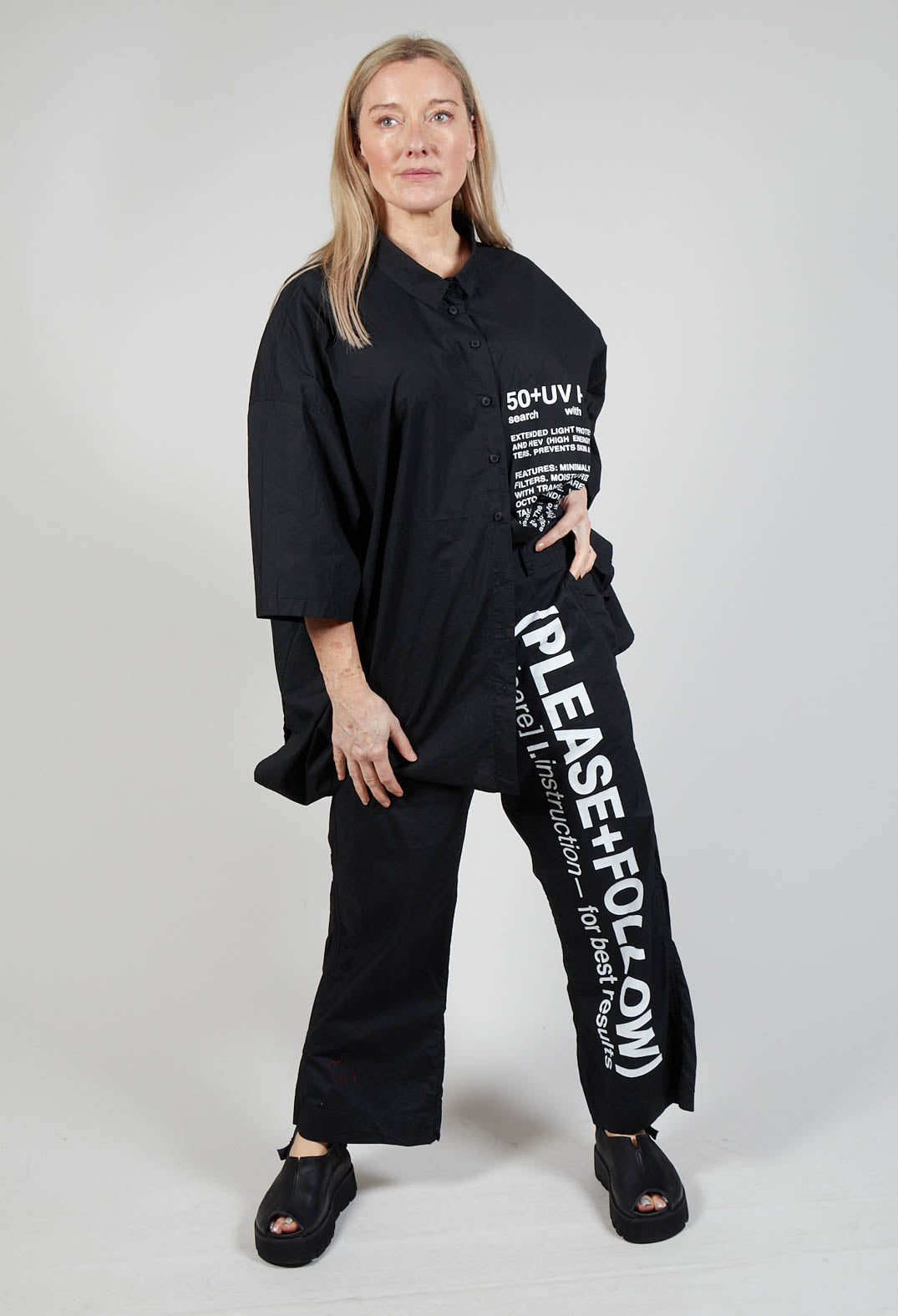 Wide Leg Trousers with Lettering Motif in Black Print
