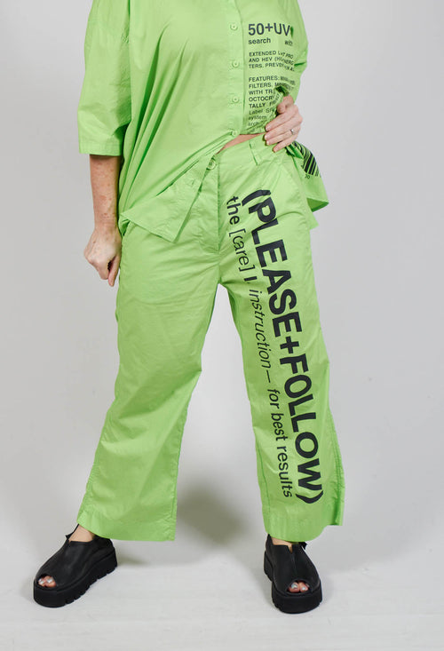 Wide Leg Trousers with Lettering Motif in Lime Print
