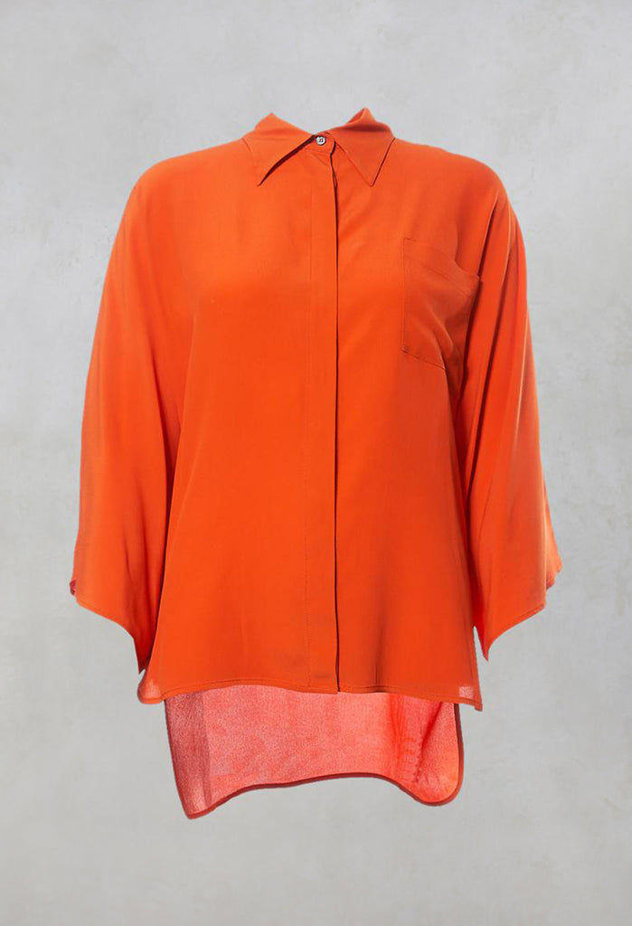 bold orange sheer silk shirt with front pocket