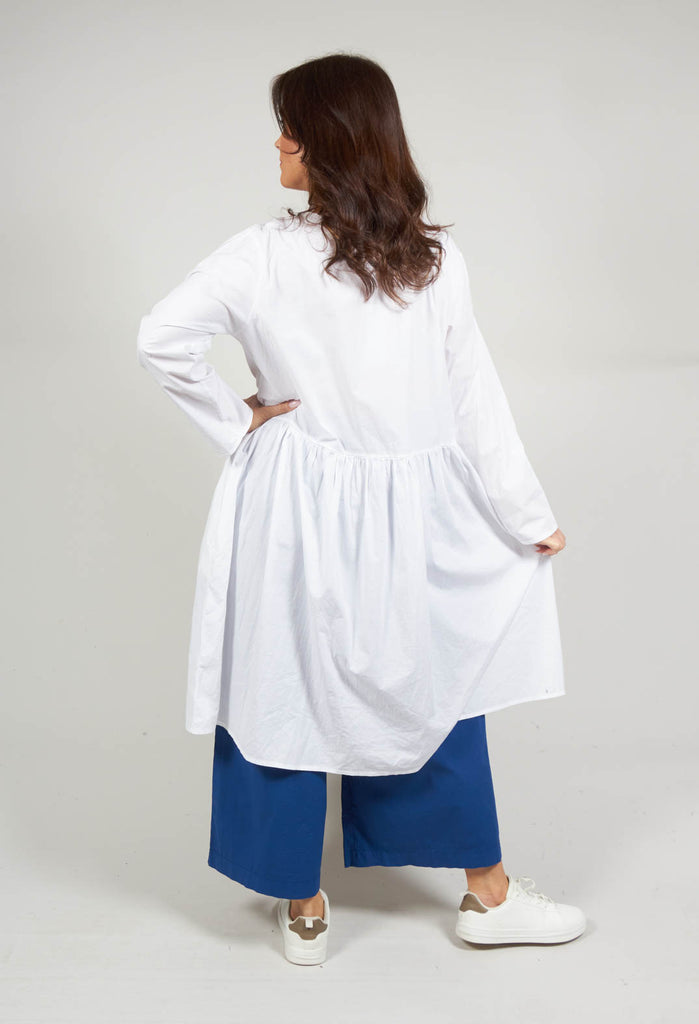 Koci Long Sleeve Smock Dress with Pockets in Bianco