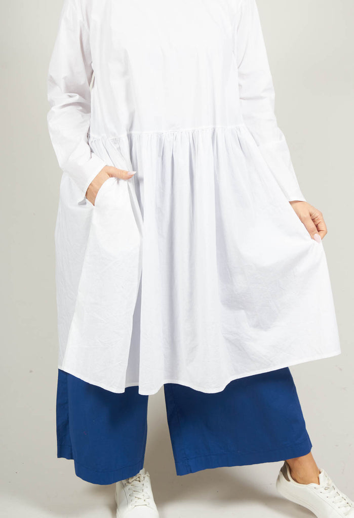 Koci Long Sleeve Smock Dress with Pockets in Bianco