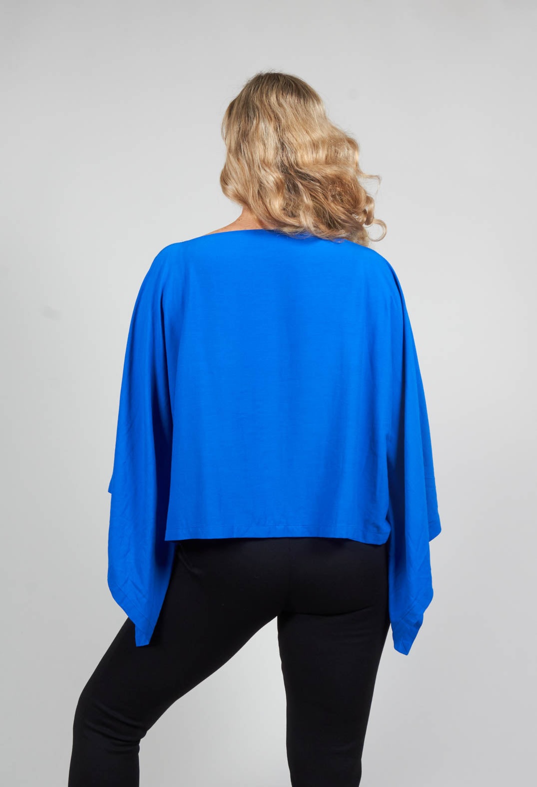 Cropped Cape Style Top with Cut Out Shoulder in Blue