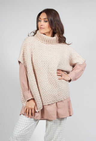 Irisou Knitted Roll Neck Poncho in Beige Rose