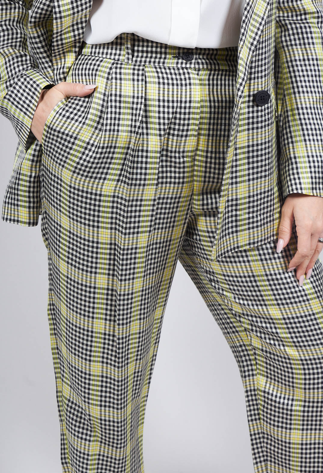 yellow check tailored trousers with front pockets and button fastening