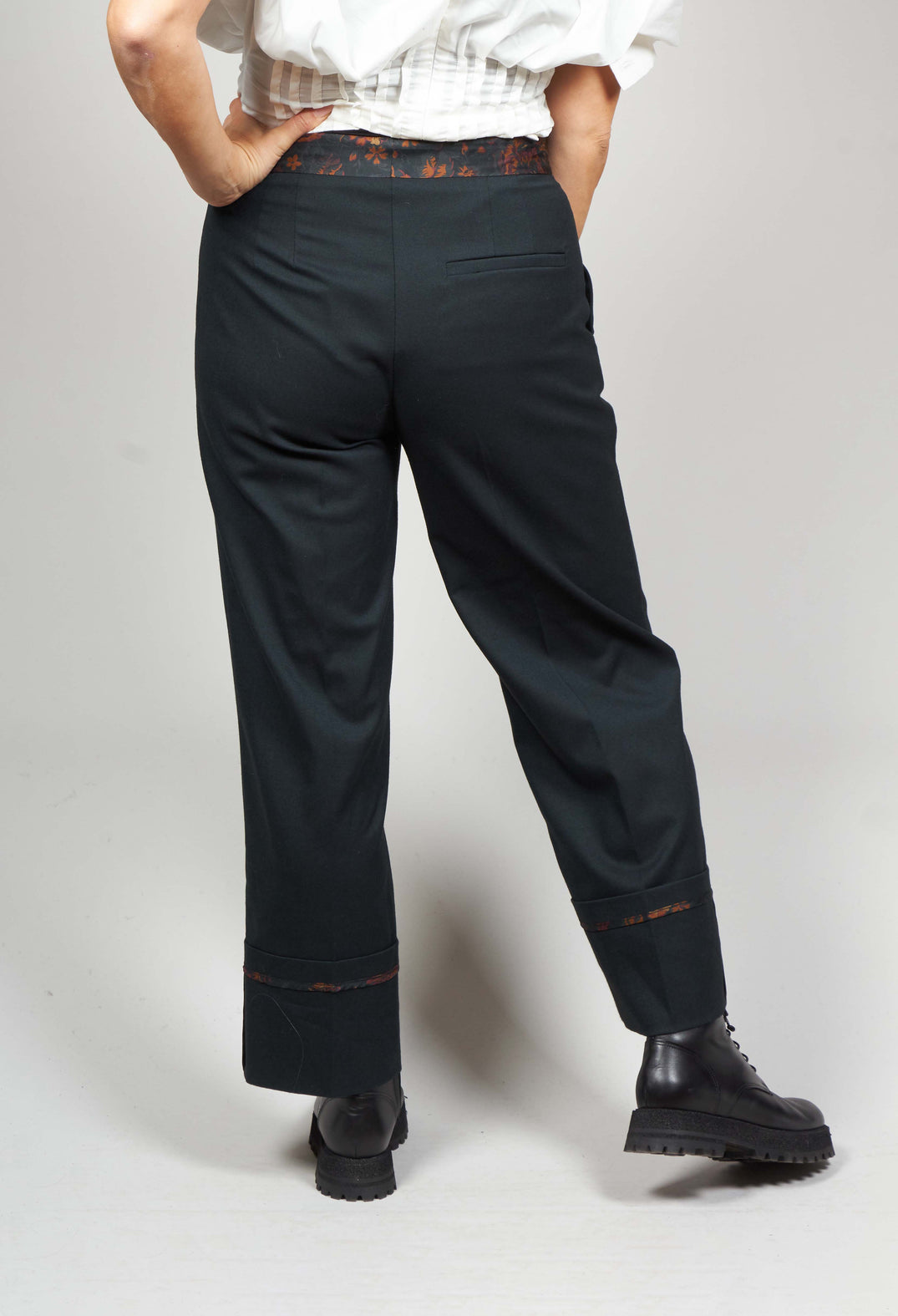 tailored trousers in dark green with floral trim