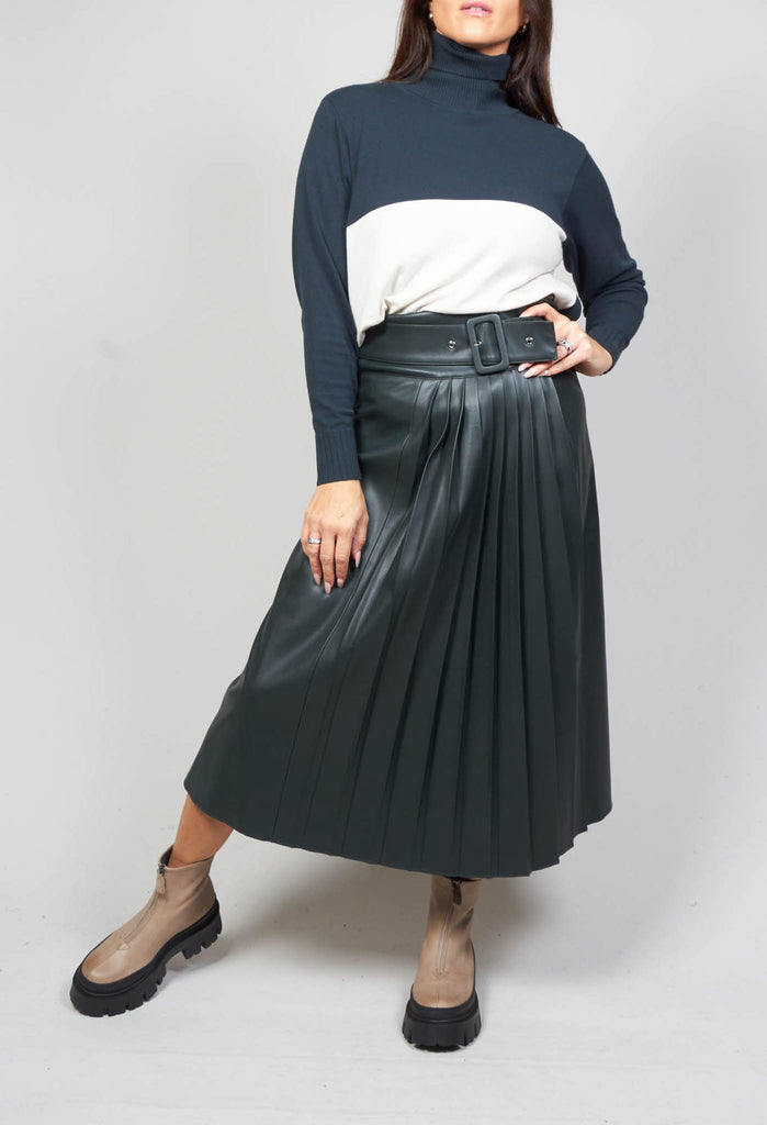 cream and peacock green polo neck 