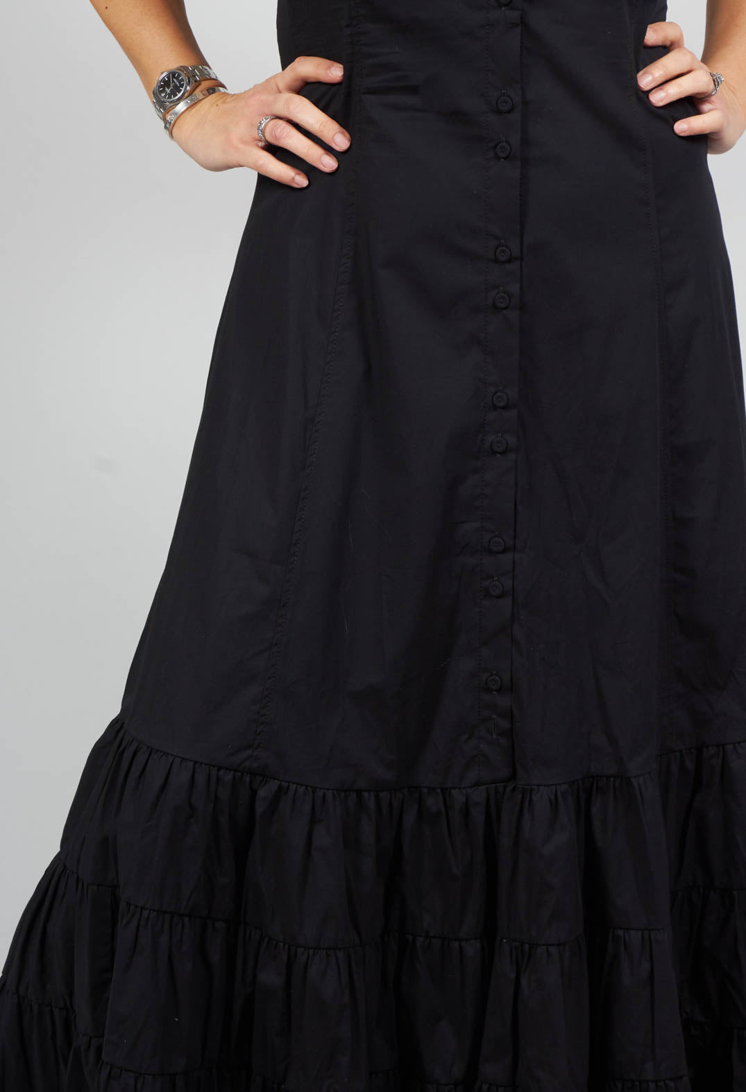 long sleeveless tiered dress with button fastening