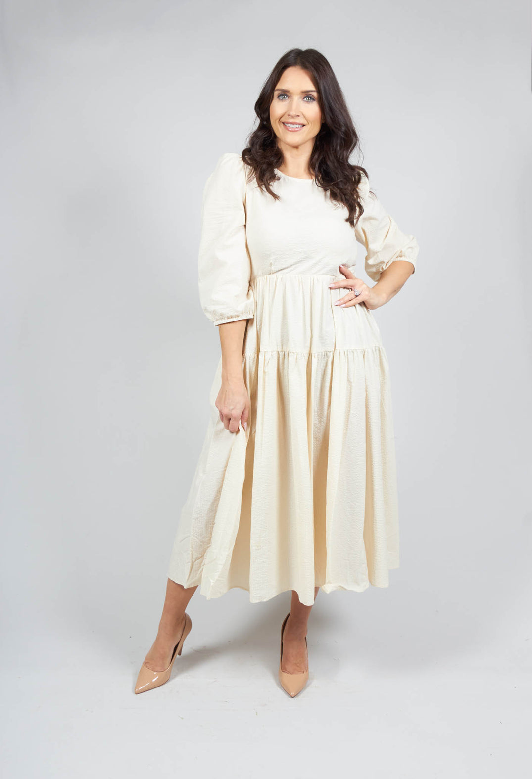 beatrice b cream shift dress with mid length sleeves and tie bow detailing