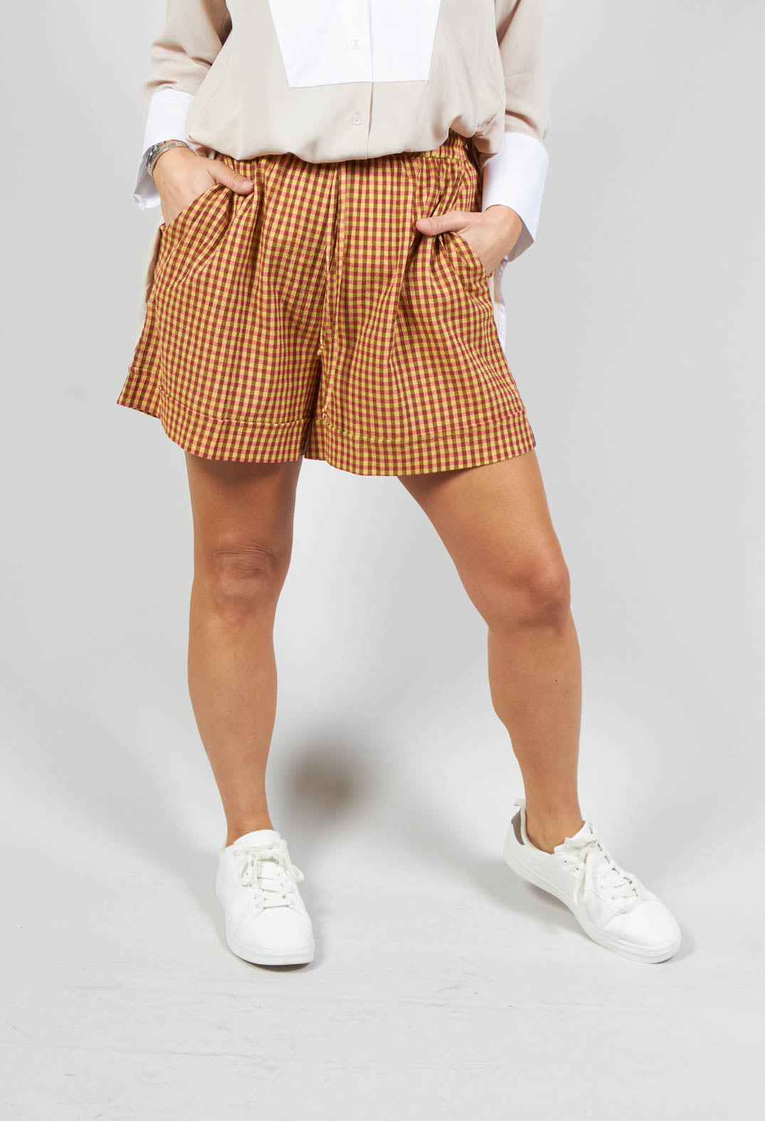 orange check turn up shorts 