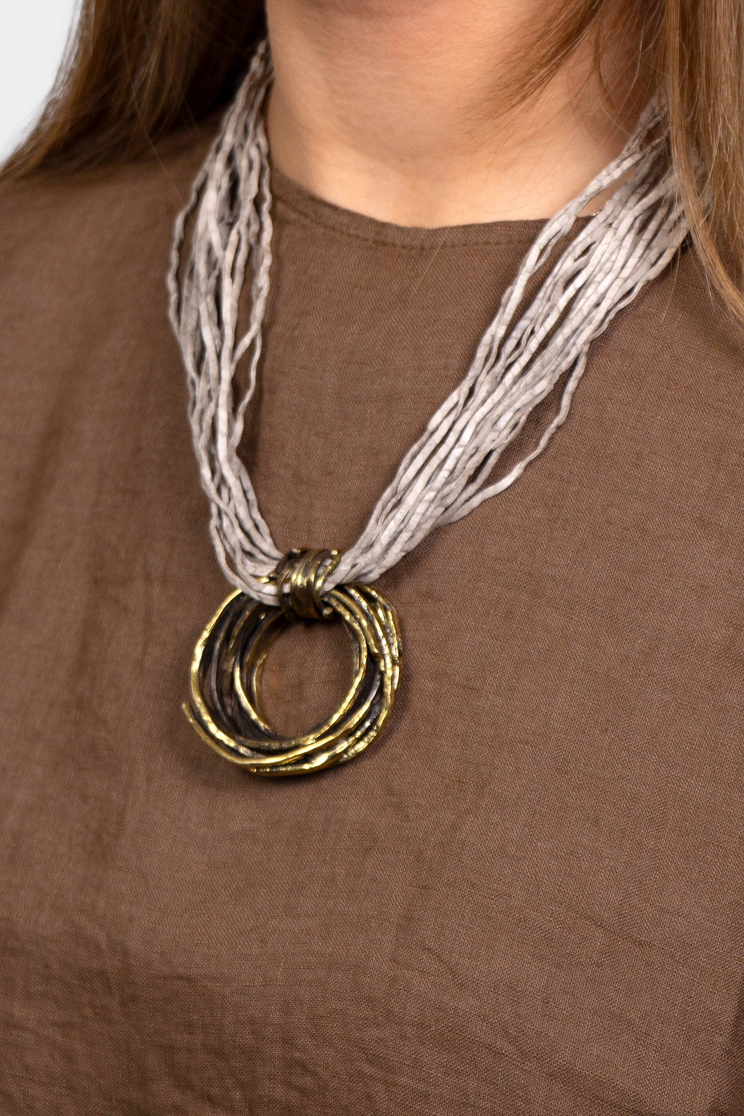 Multi Strand Necklace with Bronze Pendant