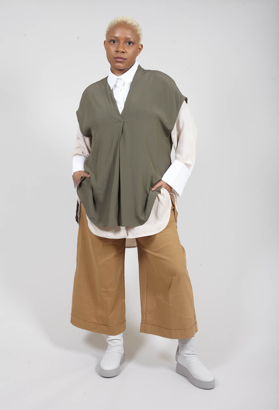 loose fit khaki green v neck top with capped sleeves