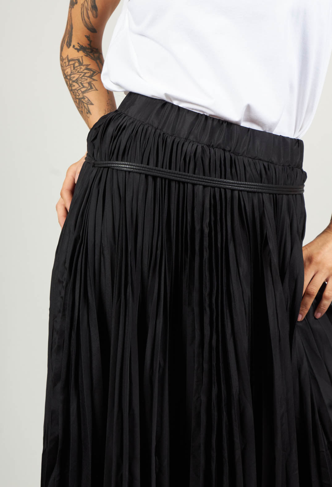 Pleated Skirt with Asymmetric Hem in Black