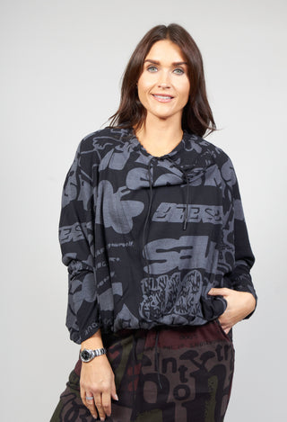 Long Sleeve Jersey Top with Cowl Neck in Black Print